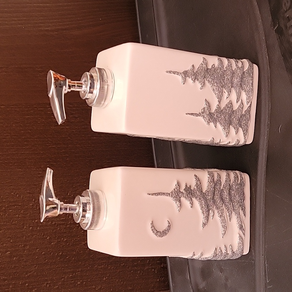Winter scene soap dispensers.